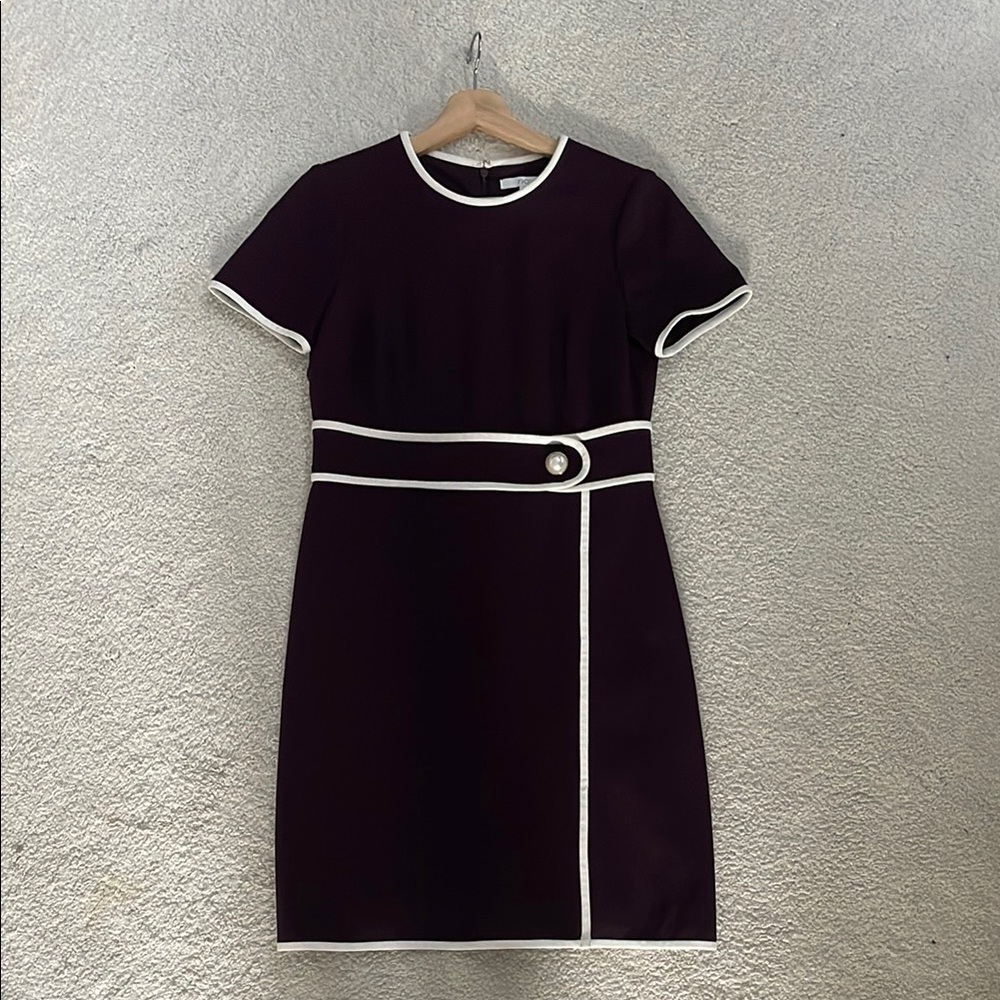 Elegant Black Dress with White Trim